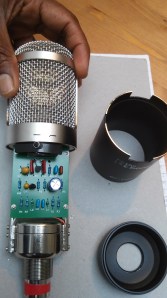 unscrew the microphone body